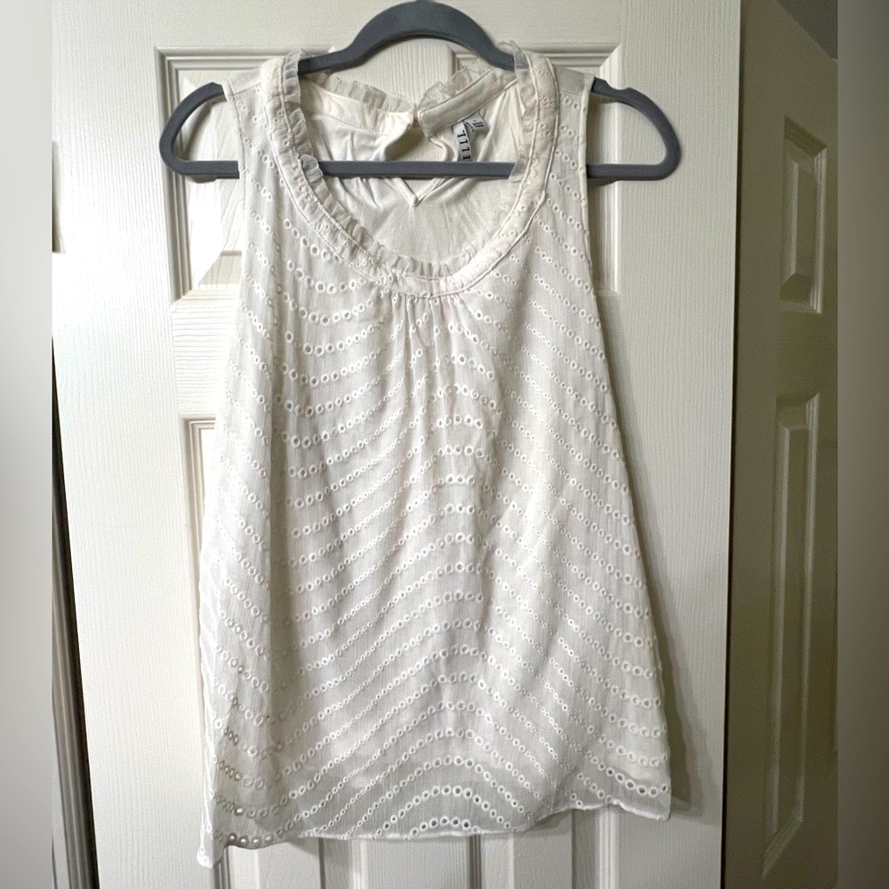 Sleeveless tank with eyelet design